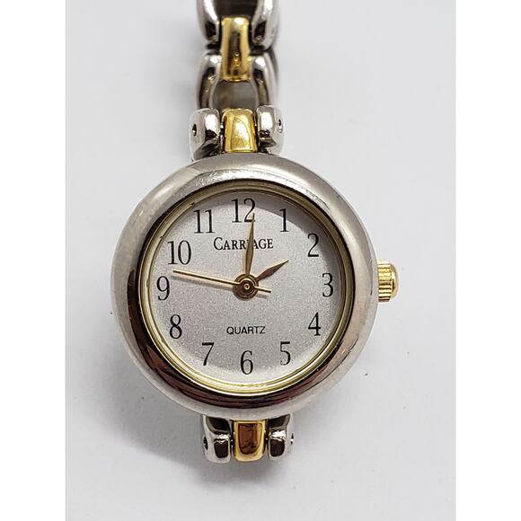 Women's Carriage by Timex watch. White face small two toned band.